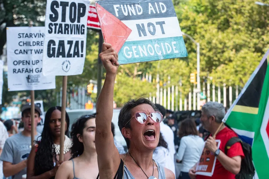 People participate in a protest in support of Palestine outside the UN as a conference on Palestine and a two-state solution takes place inside the UN on 29 July 2025 in New York City. (Stephanie Keith/Getty Images/AFP)