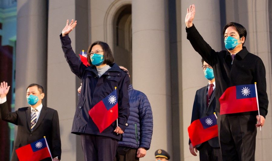 Taiwan President Tsai Ing-wen and Vice-President William Lai attend a New Year flag-raising ceremony outside the Presidential Office Building in Taipei, Taiwan, in this Taiwan Presidential Office handout released 1 January 2023. (Taiwan Presidential Office/Handout via Reuters)