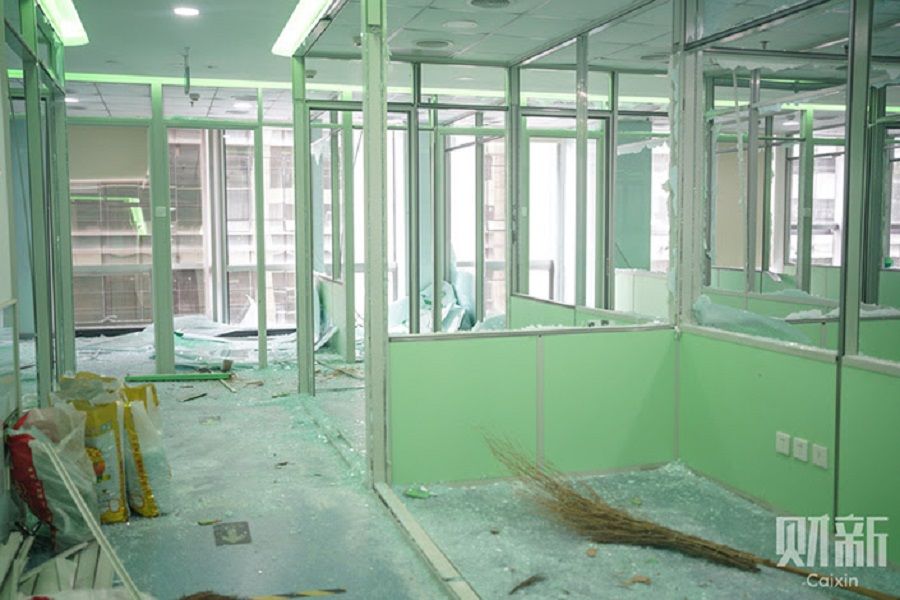 The area that used to have teaching rooms of Gaosi Education is under renovation at E-wing Center. (Zhang Ruixue/Caixin)