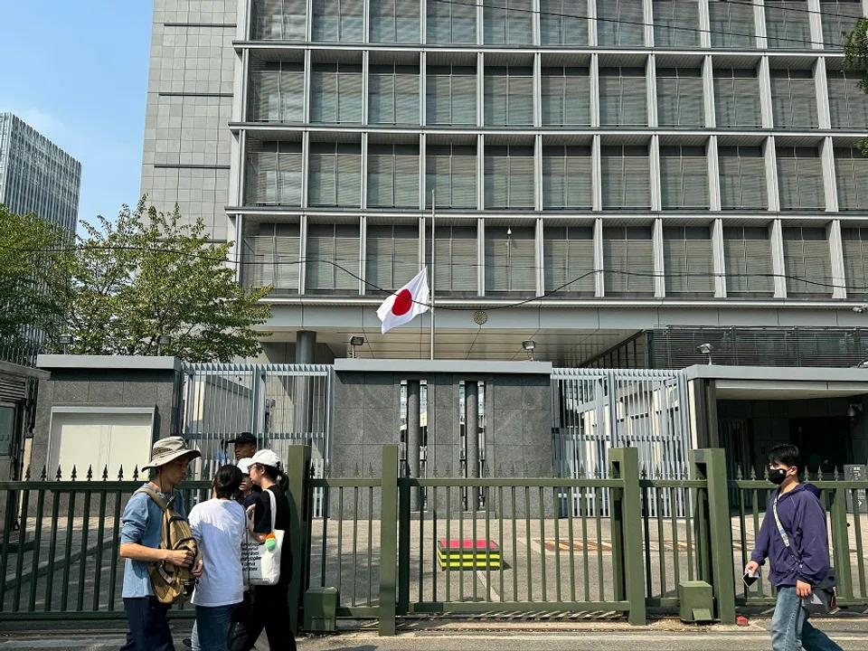 The Japanese flag flies at half mast at the Japanese embassy in Beijing, China on 19 September 2024. (SPH Media)