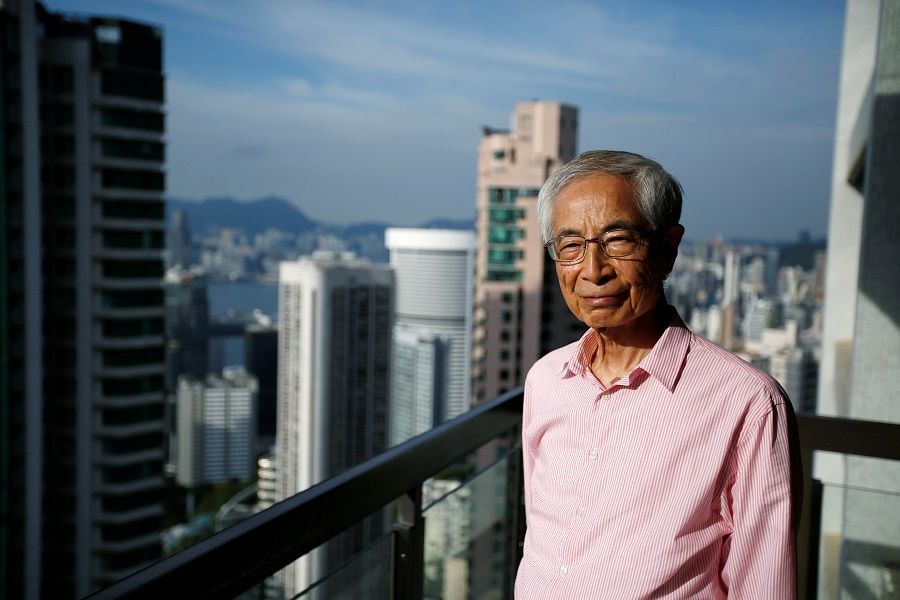 Martin Lee, known as the "Father of democracy" in Hong Kong, stands in front of the city's skyline during a recent interview in Hong Kong, China, in this undated image. (James Pomfret/Reuters)