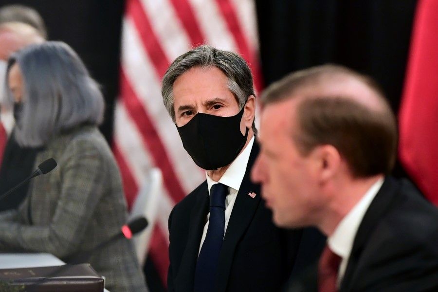US national security adviser Jake Sullivan (R) speaks as US Secretary of State Antony Blinken looks on, at the opening session of US-China talks at the Captain Cook Hotel in Anchorage, Alaska, US on 18 March 2021. (Frederic J. Brown/Pool via Reuters)