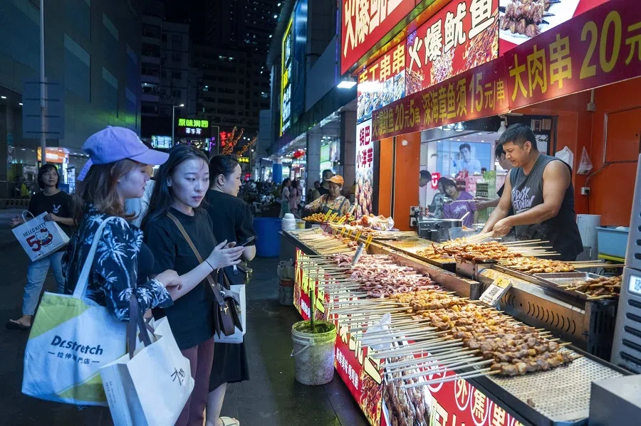 Customers at the Dongmen Market in Shenzhen, China, on 2 July 2024. (Raul Ariano/Bloomberg)