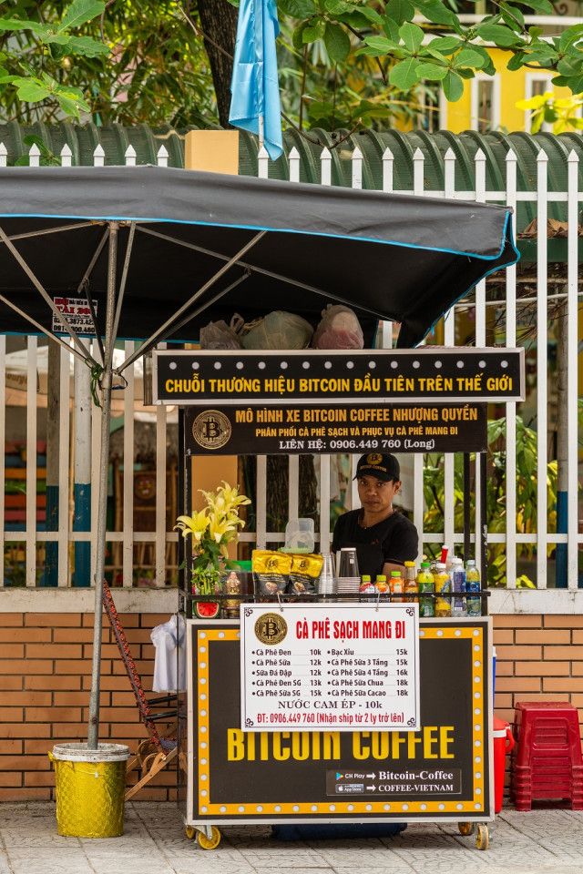 A vendor mans a stall named "Bitcoin Coffee" in Da Nang, Vietnam. (iStock)