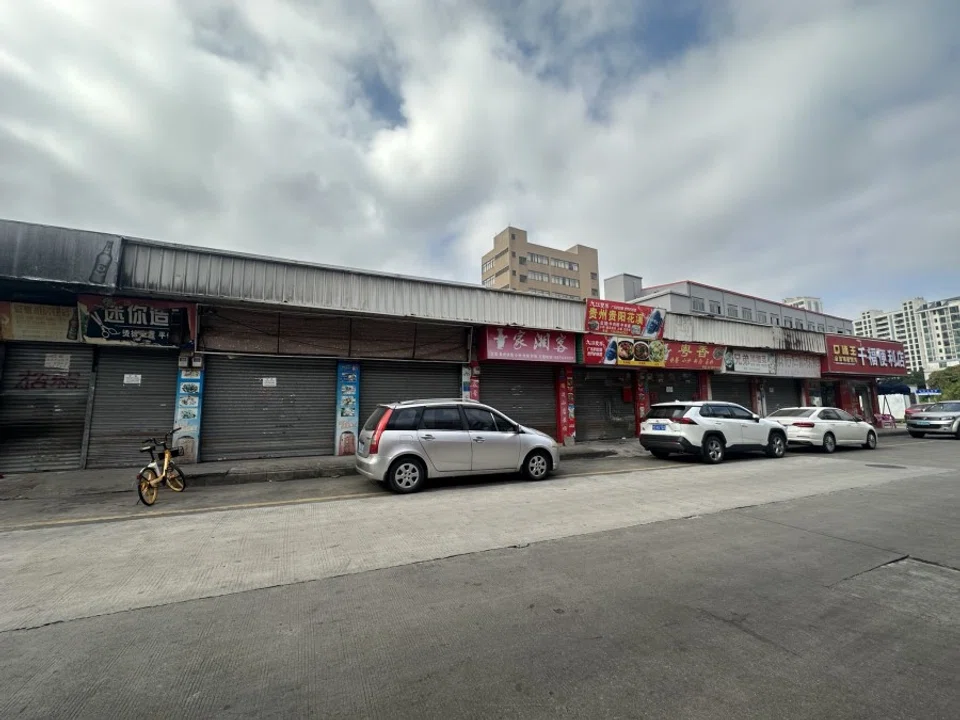 A row of vacant shops along nearly empty streets in Dongguan, Guangdong province, China, on 23 November 2023.