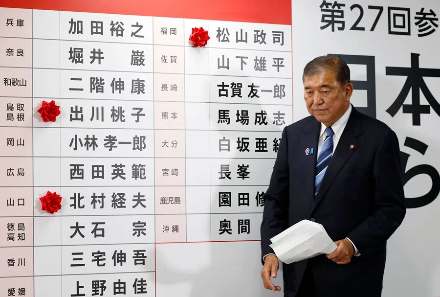 Japan's Prime Minister Shigeru Ishiba walks after addressing the media at the vote counting centre in the Liberal Democratic Party (LDP) headquarters in Tokyo on 20 July 2025. (Franck Robichon/Pool/AFP)