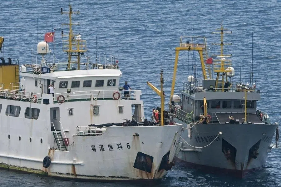 Ships identified by the Philippine Coast Guard as Chinese research vessels are seen at Scarborough Shoal in the disputed South China Sea on 15 June 2026.
