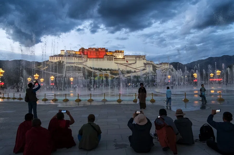 People take photographs of the musical fountain at Potala Palace Square in Lhasa, Tibet, on 27 June 2023. (CNS)