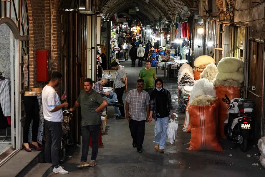People visit the historic bazaar of Tabriz, believed to be one of the oldest bazaars in the Middle East, in northwestern Iran on 17 September 2025. (Atta Kenare/AFP)