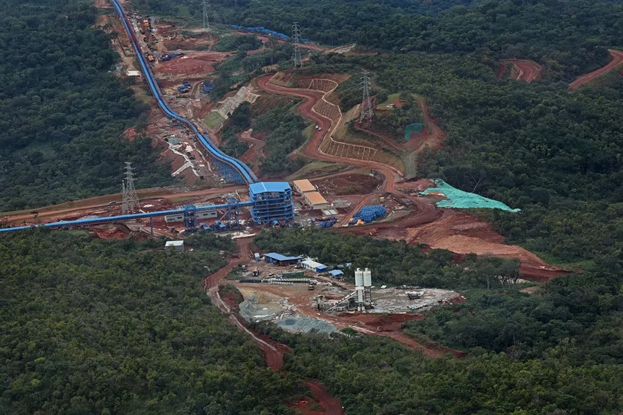 More than 30 kilometres of linkways and transport systems now carry raw materials from the mountaintop to the base, where they are loaded onto trains for a 600-kilometre journey to the port of Boké for shipment and further processing. (SPH Media)