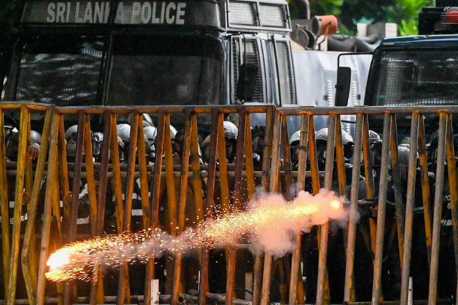 Police fire tear gas shells to disperse students taking part in an anti-government protest demanding the resignation of Sri Lanka's President Gotabaya Rajapaksa over the country's crippling economic crisis, in Colombo, Sri Lanka, on 29 May 2022. (Ishara S. Kodikara/AFP)