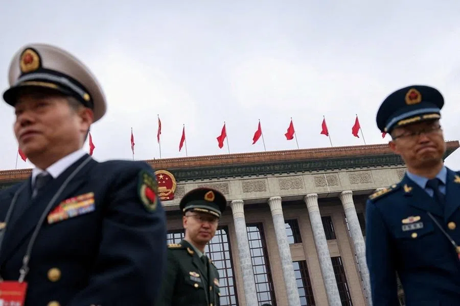 Members from Chinese People's Liberation Army (PLA) Ground Force, Navy and Air Force leave the Great Hall of the People following the opening session of the annual Chinese People's Political Consultative Conference (CPPCC) in Beijing, China, on 4 March 2026.