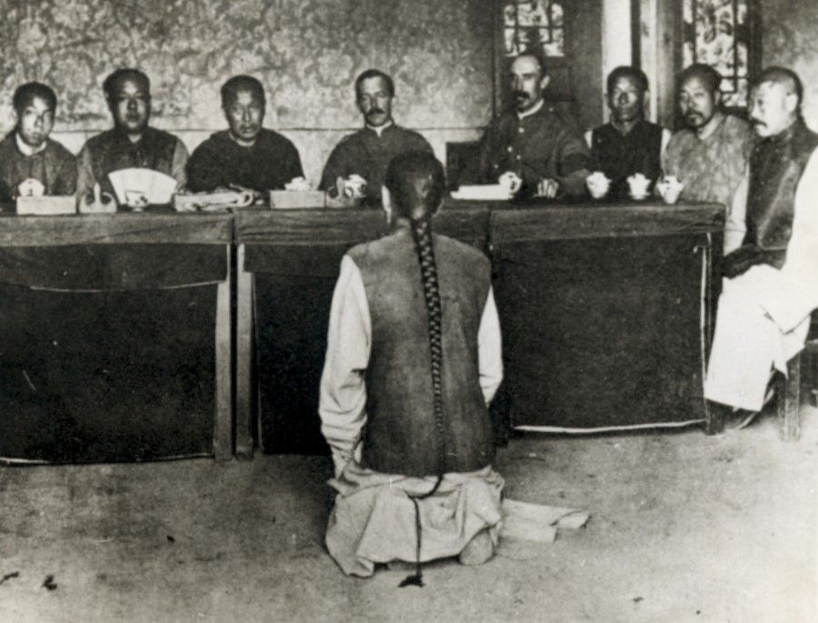 Europeans judging a Boxer. Scores of Chinese were brought to trial for opposing the Western powers when their Boxer Rebellion was crushed by the combined military might of the colonisers. (SPH Media)
