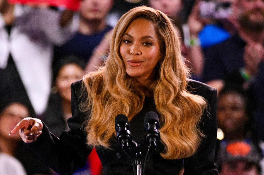 US singer-songwriter Beyonce speaks during a campaign rally for US Vice President and Democratic presidential candidate Kamala Harris at Shell Energy Stadium in Houston, Texas, on 25 October 2024. (Miguel J. Rodriguez Carrillo/AFP)