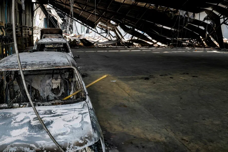 The aftermath of a fire at a Chinese-owned garment factory is pictured in the Hlaing Tharyar industry zone in Yangon on March 21, 2021. (STR/AFP)