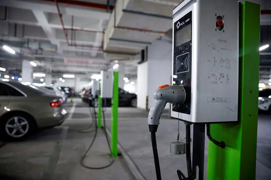 An electric car charging station is pictured in a parking lot in Shanghai, China, 13 March 2021. (Aly Song/File Photo/Reuters)