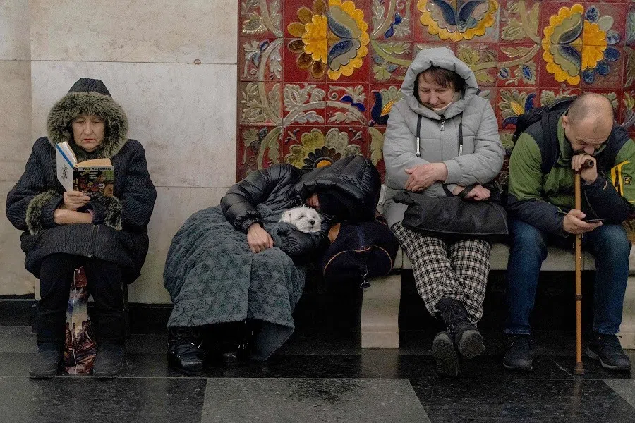 Local residents take shelter in a metro station during an air strike alarm in Kyiv, on 28 November 2024, amid the Russian invasion of Ukraine.