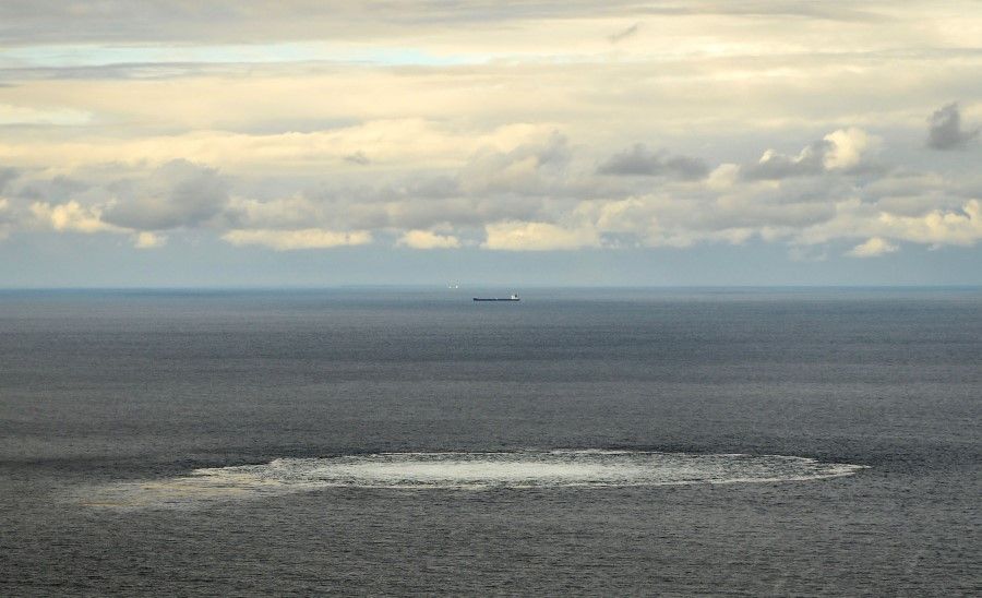 This handout picture released on 30 September 2022 by the Danish Defence Command and taken on 29 September 2022 shows one of four gas leaks at one of the damaged Nord Stream gas pipelines in the Baltic Sea. (Handout/Danish Defence/AFP)