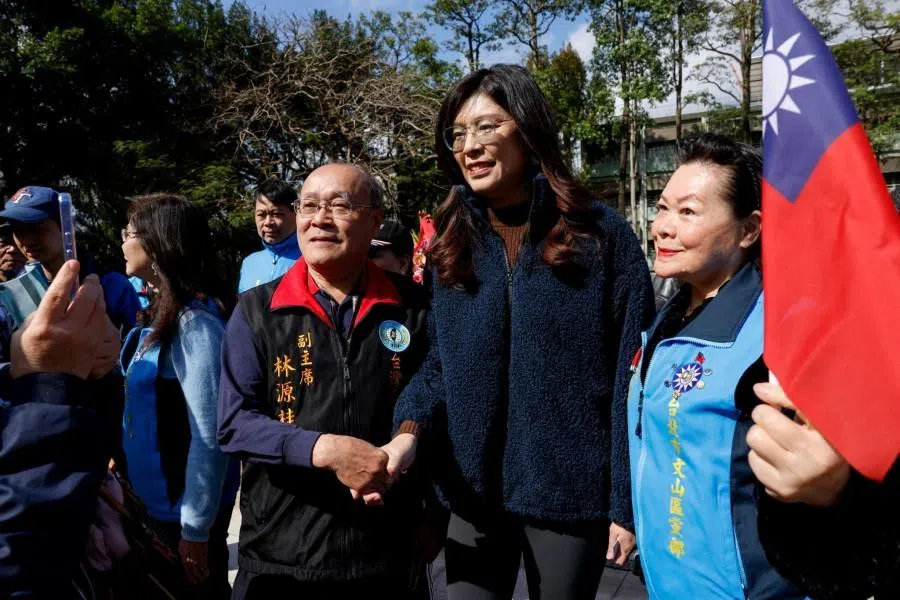 Cheng Li-wun, the chairwoman of Taiwan’s largest opposition party, the Kuomintang pose for photos with supporters at an event in Taipei, Taiwan, on 12 March 2026. (Ann Wang/Reuters)