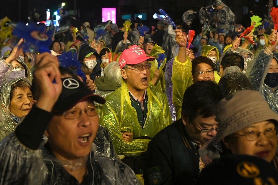 Supporters of Taiwan presidential candidate William Lai Ching-te, from the ruling Democratic Progressive Party (DPP), chant slogans during an election campaign in Taipei, Taiwan, on 30 November 2023. (Sam Yeh/AFP)