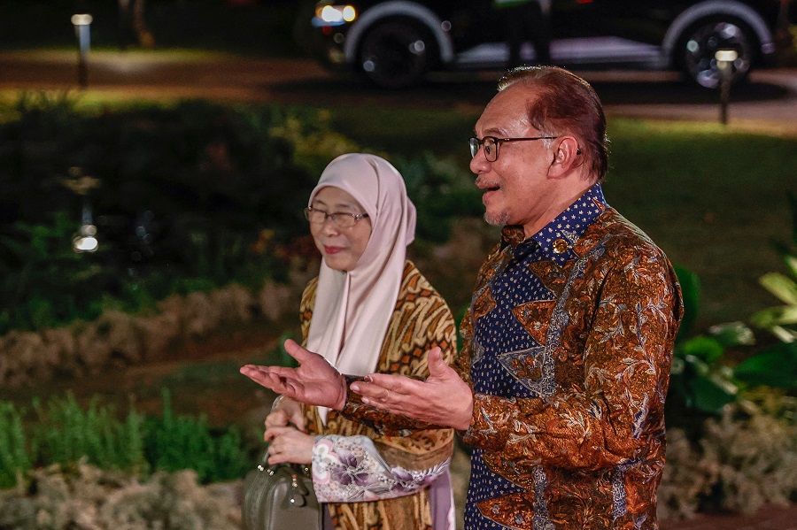 Malaysia's Prime Minister Anwar Ibrahim and his wife Wan Azizah Wan Ismail arrive for the gala dinner of the 43rd ASEAN Summit in Jakarta on 6 September 2023. (Mast Irham/AFP)