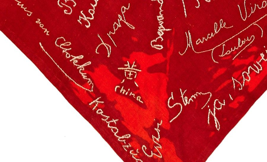 Nadine's surname embroidered on the kerchief. (Yad Vashem)