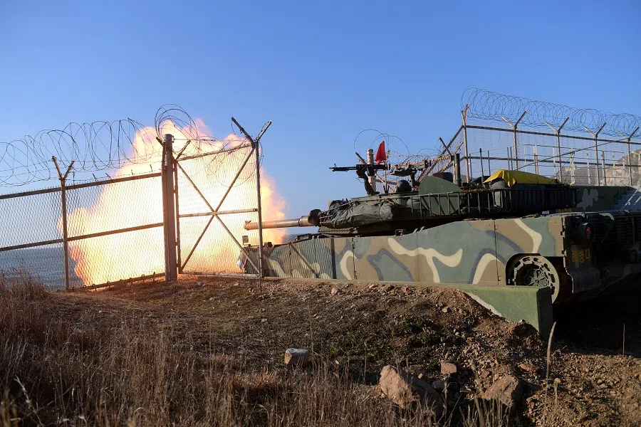 South Korean marine's K1E1 tank fires during a military drill on Yeonpyeong Island, South Korea, on 5 January 2024. (The Defense Ministry/Handout via Reuters)