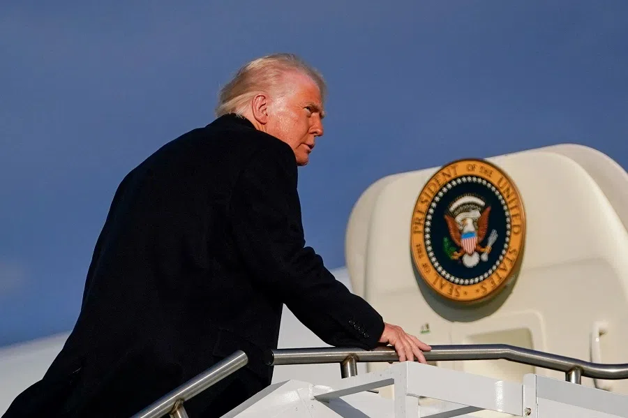 US President Donald Trump boards Air Force One as he departs for Philadelphia, Pennsylvania, from Morristown Municipal Airport in Morristown, New Jersey, US, on 22 March 2025.