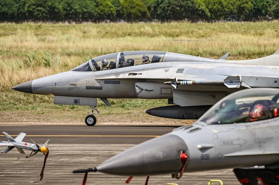 Philippine Air Force pilots onboard a Philippine Air Force FA-50 land during the US-Philippines joint air force military exercise dubbed “Cope Thunder” at Basa Air Base in Pampanga, the Philippines, on 11 April 2024. (Jam Sta Rosa/AFP)