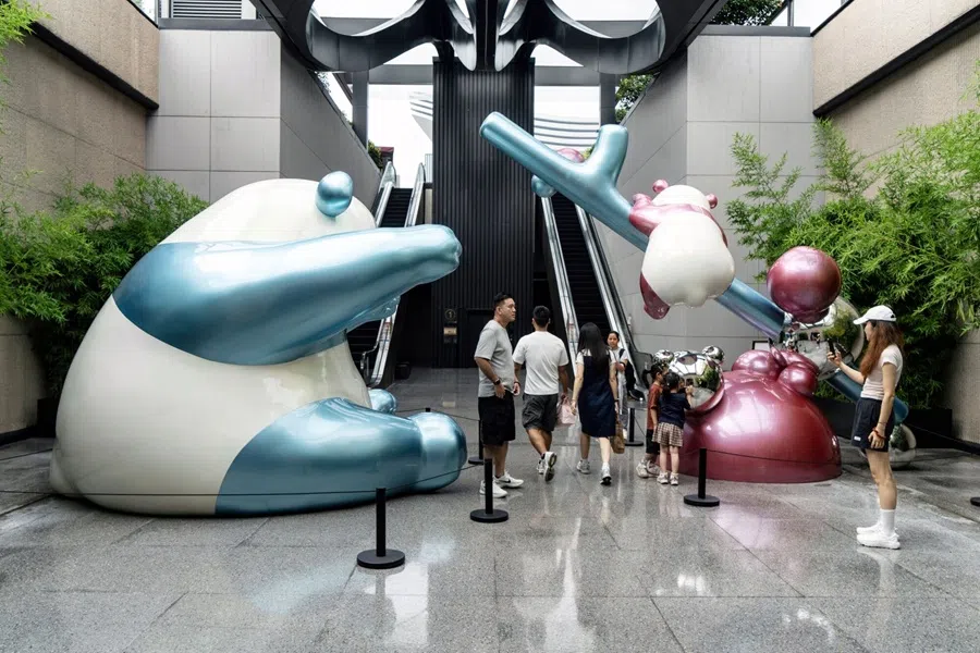 People at a shopping complex in Chengdu, China, on 17 August 2025. (Bloomberg)