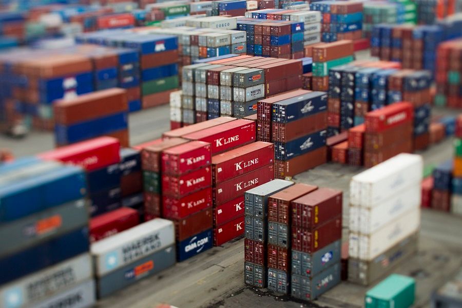 Containers stand at the Manila International Container Terminal in this photo taken with a tilt-shift lens in Manila, Philippines, on 5 January 2012. (Brent Lewin/Bloomberg)