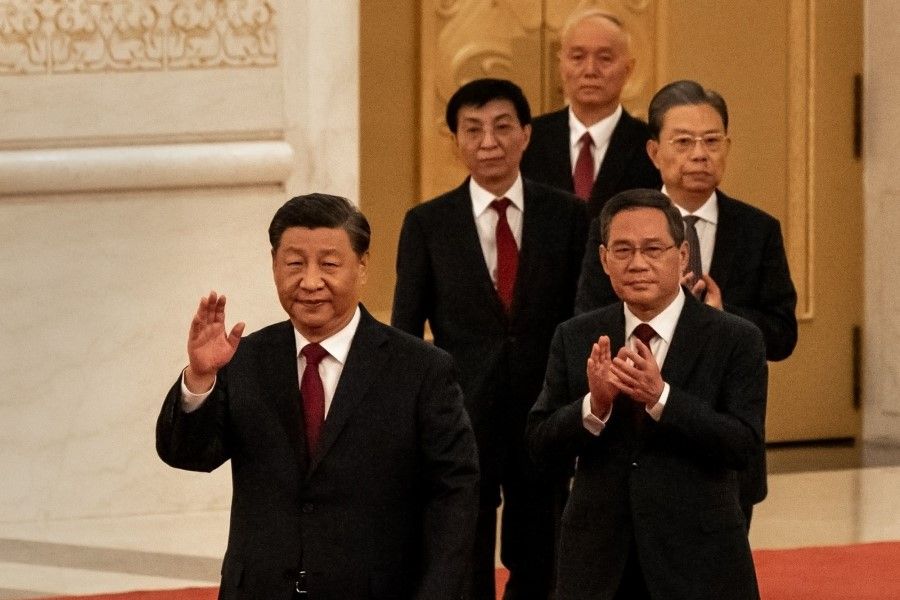 Chinese President Xi Jinping leads members of the Chinese Communist Party's new Politburo Standing Committee as they arrive at the Great Hall of the People in Beijing, China, on 23 October 2022. President Xi Jinping stacked China's most powerful body with his allies, giving him unfettered control over the world's second-largest economy. (Bloomberg)