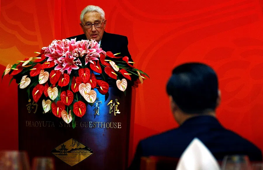 Former US Secretary of State Henry Kissinger (left) looks at Chinese Vice-President Xi Jinping as he speaks, during celebrations to mark the 40th anniversary of President Richard Nixon's historic visit to China, in Beijing, China, on 16 January 2012. (David Gray/Reuters)