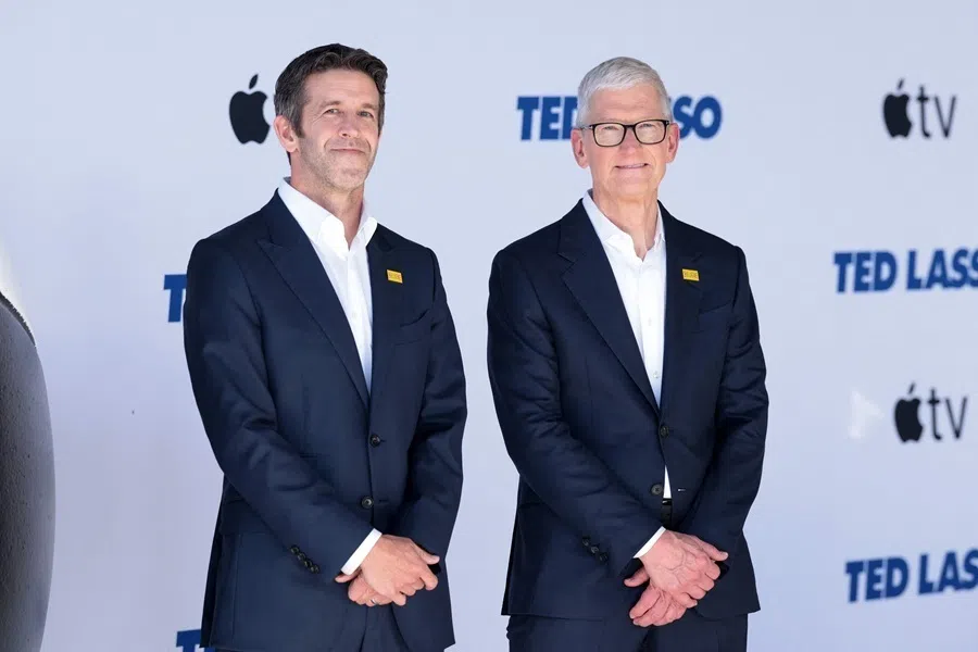 Apple senior vice-president John Ternus (left) and CEO Tim Cook attend the premiere of Apple TV's "Ted Lasso" season 4 at the Academy Museum of Motion Pictures in Los Angeles, California, on 27 July 2026.