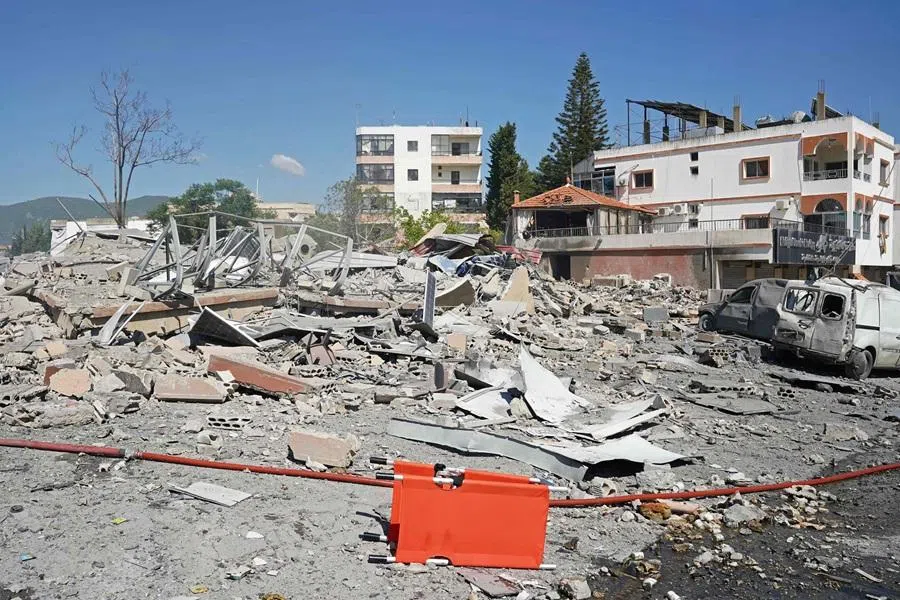 A view of destroyed buildings is pictured at the site of an Israeli airstrike that targeted the southern Lebanese village of Habbouch on 7 May 2026. (Abbas Fakih/AFP)