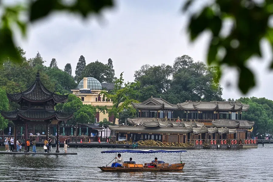 People tour West Lake in Hangzhou, Zhejiang province, China, 22 September 2023. (SPH Media)