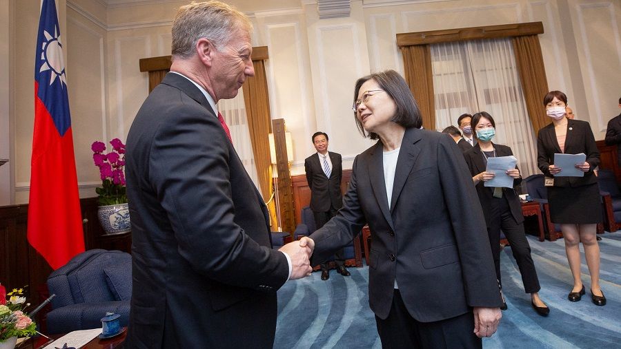 Taiwan President Tsai Ing-wen shakes hands with US Republican Representative for Oklahoma Kevin Hern, chairman of the Republican Study Committee (RSC), at the presidential office in Taipei, Taiwan in this handout image released 4 July 2023. (Taiwan Presidential Office/Handout via Reuters)