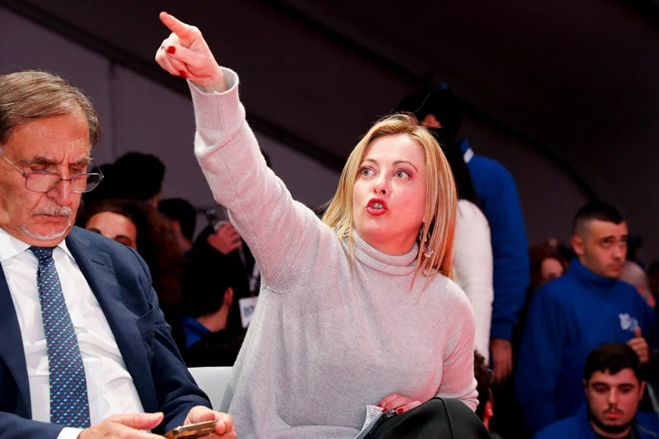 Italian Prime Minister and leader of Brothers of Italy party Giorgia Meloni gestures as she attends an event to mark the 10th anniversary of the foundation of Brothers of Italy party in Rome, Italy, 17 December 2022. (Remo Casilli/Reuters)