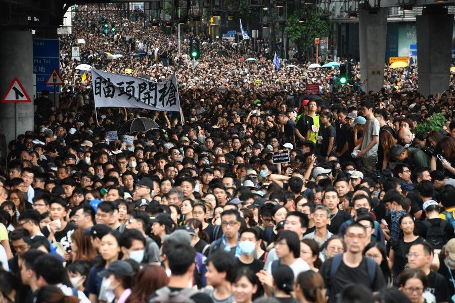 Protesters against the extradition bill in Hong Kong marching near West Kowloon station, in Hong Kong, on 7 July 2019. (SPH Media)