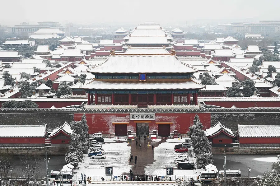 Snow-covered rooftops are seen in the Forbidden City after an overnight snowfall in Beijing, China, on 11 December 2023. (Greg Baker/AFP)