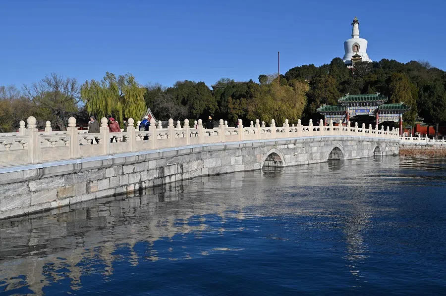 The White Dagoba or Bai Ta, an onion shaped shrine in the Tibetan style, is seen at the Beihai park in Beijing on 27 November 2024. (Adek Berry/AFP)