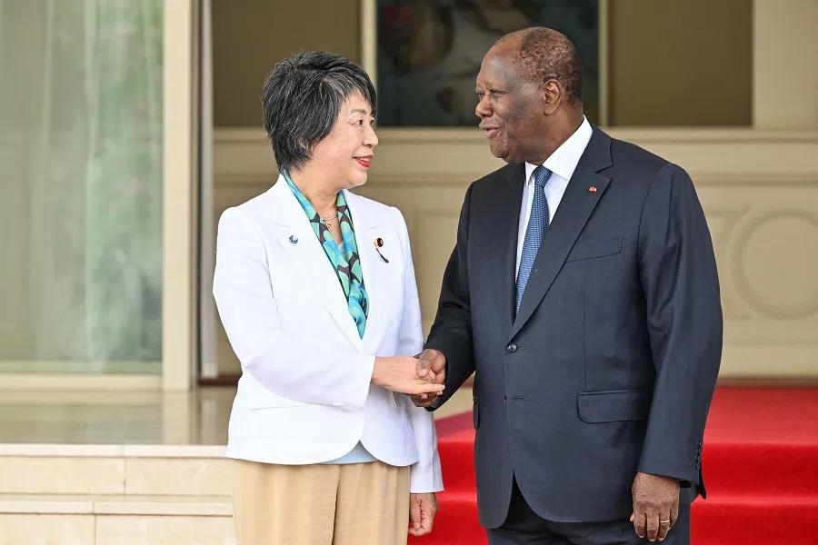Ivorian President Alassane Ouattara shakes hands with Japanese foreign Minister Yoko Kamikawa at President Ouattara’s residence in Abidjan on 29 April 2024. (Issouf Sanogo/AFP)
