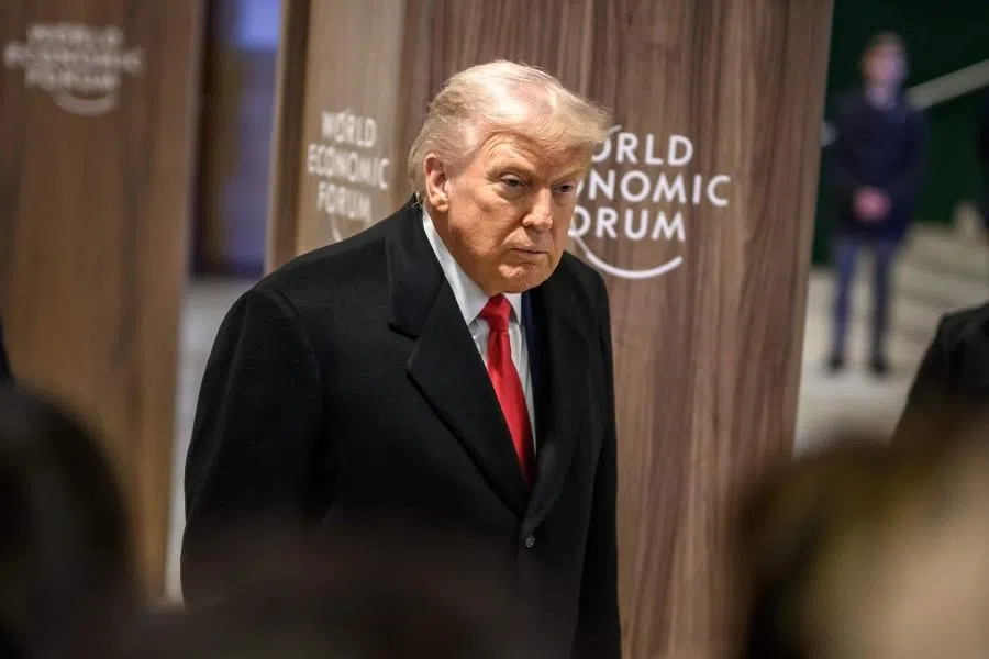 US President Donald Trump addresses the media as he leaves the Congress Center during the World Economic Forum (WEF) annual meeting in Davos on 21 January 2026. (Fabrice Coffrini/AFP)