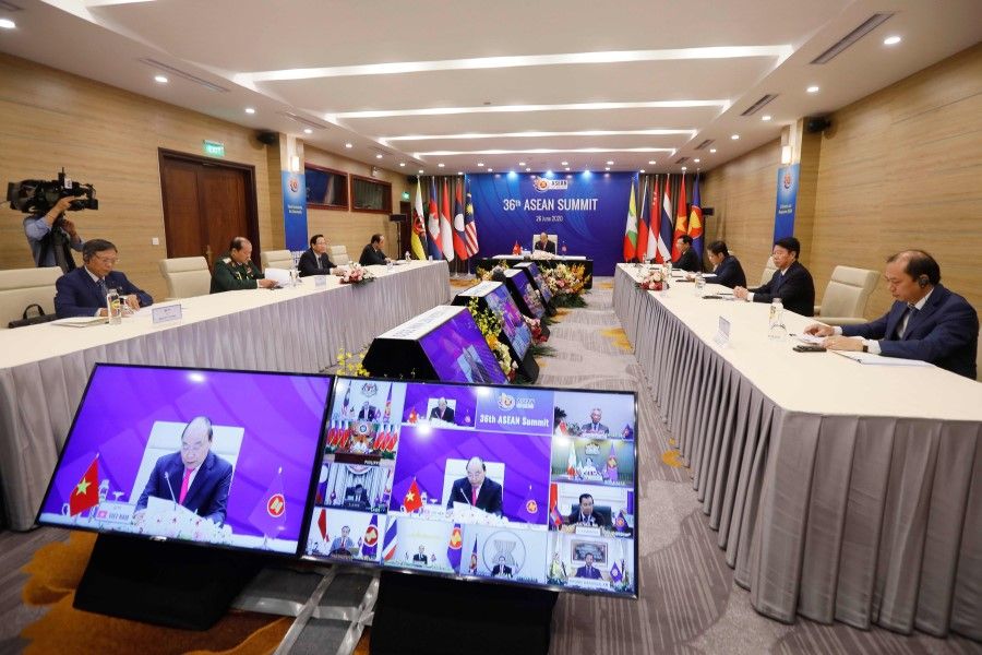Vietnam's Prime Minister Nguyen Xuan Phuc (C) addresses regional leaders during the Association of Southeast Asian Nations (ASEAN) Summit, held online due to the coronavirus pandemic, in Hanoi, 26 June 2020. (Luong Thai Linh/AFP)