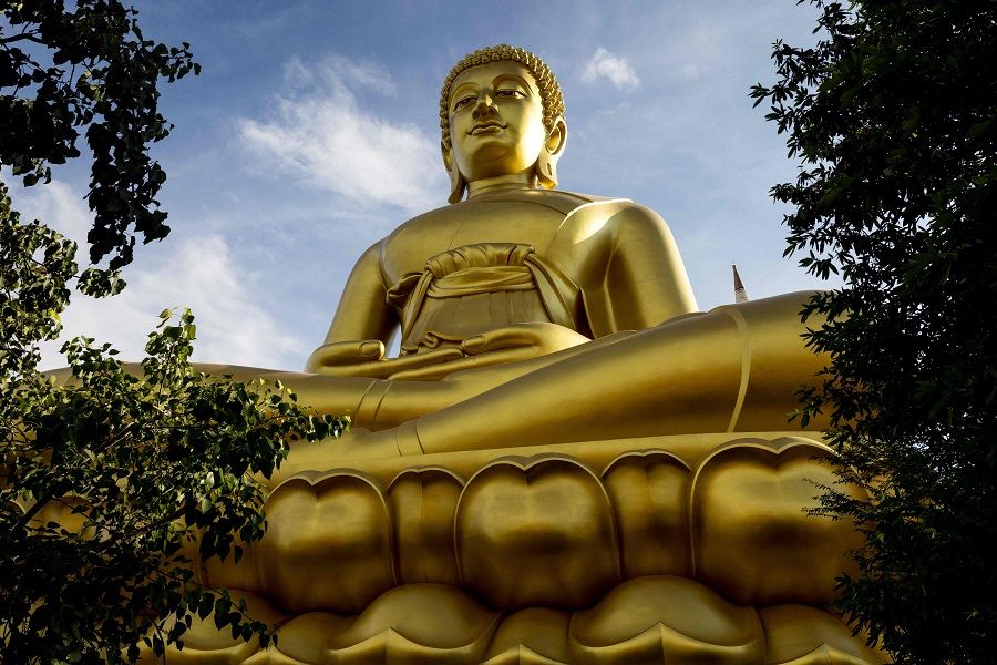 A 69-metre-tall giant Buddha statue stands at the Wat Paknam Phasi Charoen temple on the outskirts of Bangkok, Thailand, on 12 October 2021. (Jack Taylor/AFP)