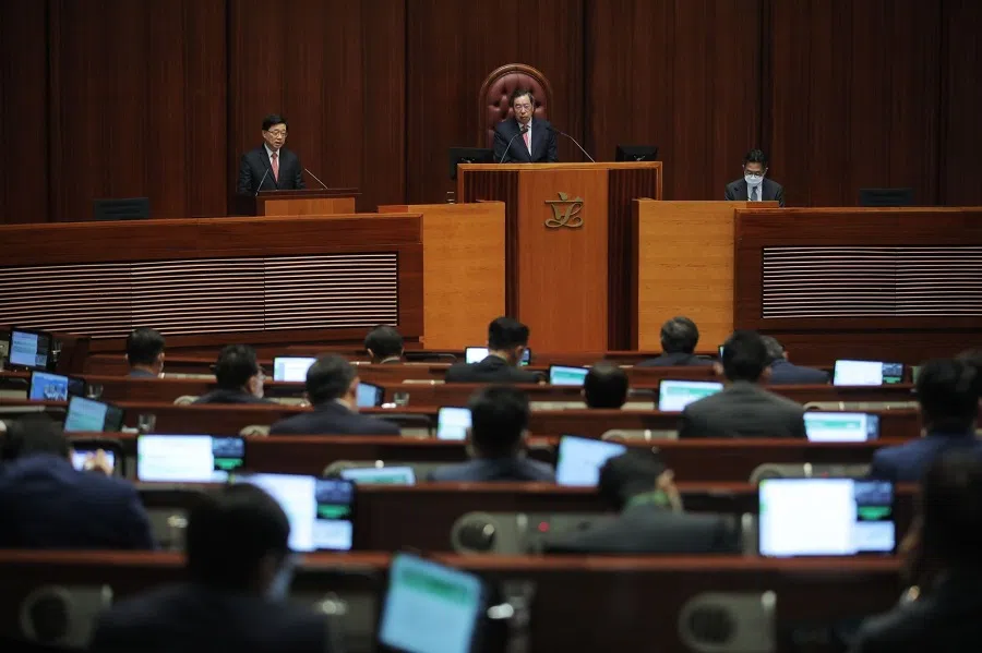 John Lee (left), Hong Kong's chief executive, delivers his policy address at the Legislative Council in Hong Kong, China, on 19 October 2022. (Paul Yeung/Bloomberg)