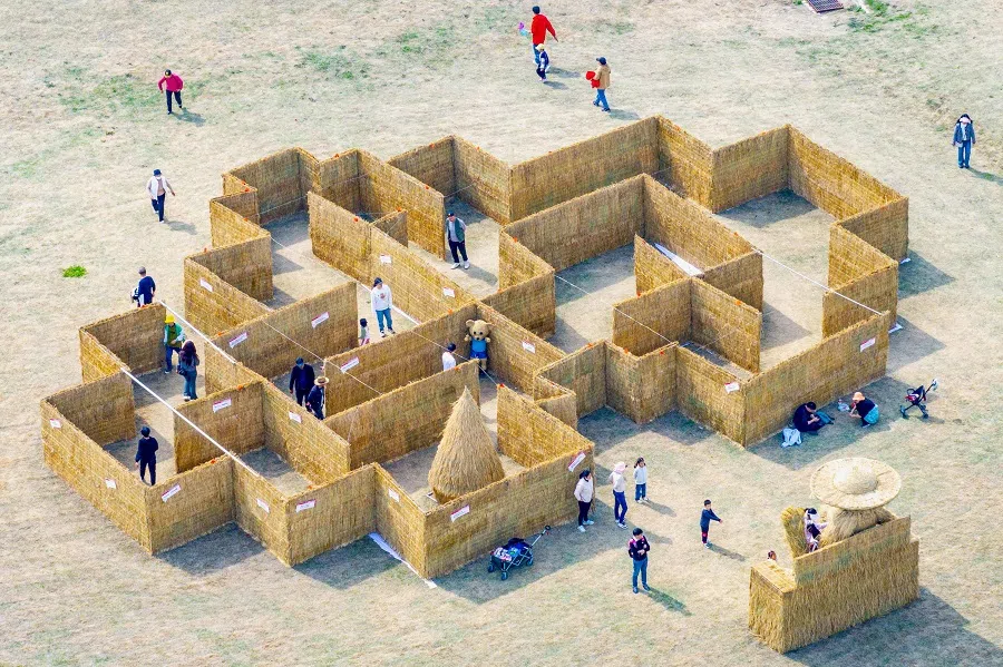 This aerial photograph taken on 5 April 2024 shows tourists at a vacation resort in Huai'an, in eastern China's Jiangsu province. (AFP)