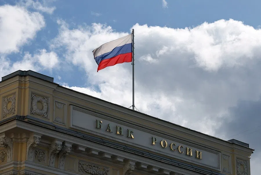 A flag flies above the headquarters of the Russian Central Bank in Moscow, Russia, 11 September 2026.