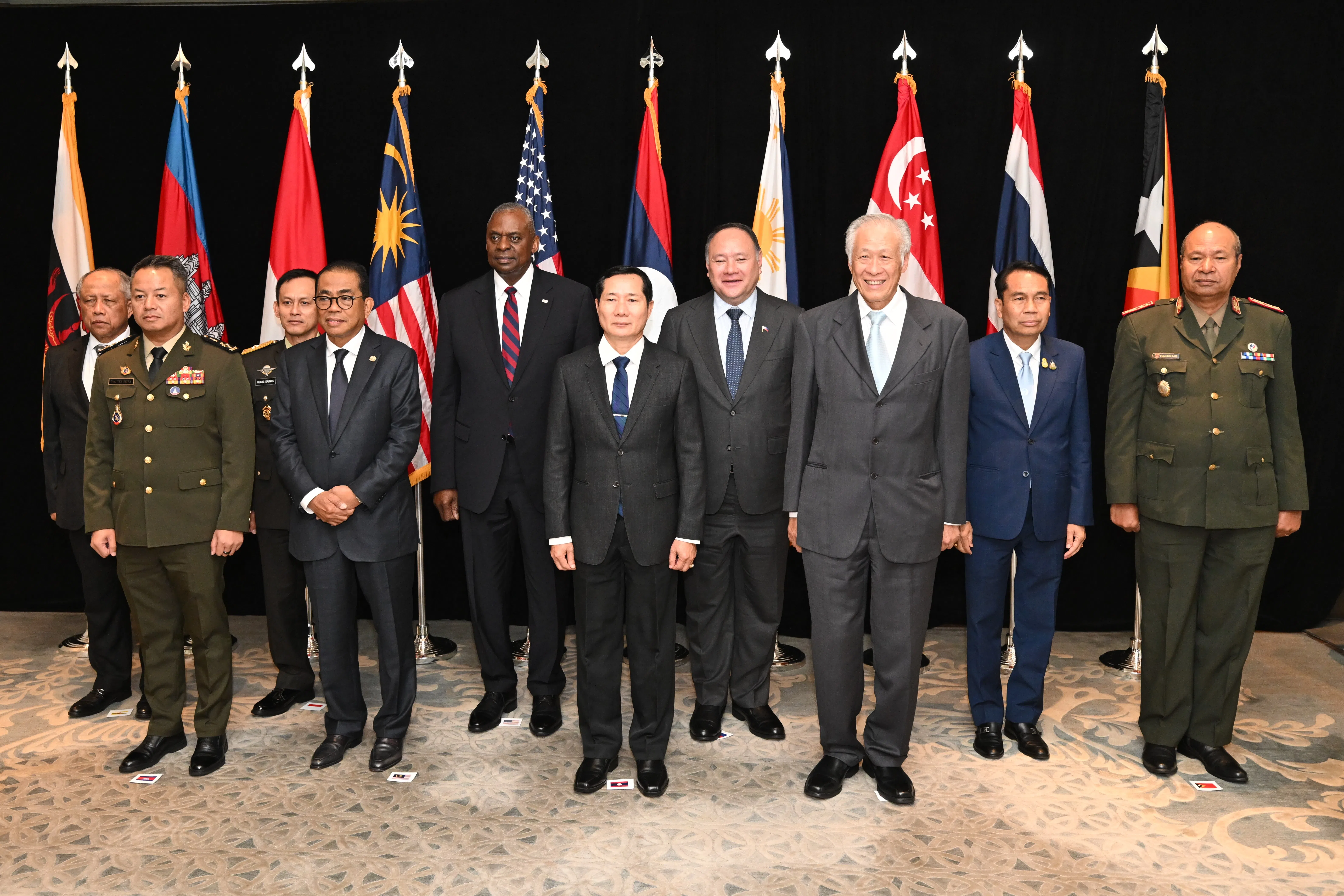 Singapore Defence Minister Ng Eng Hen (third from right) with other Southeast Asian defence ministers and their representatives, including Malaysia’s Mohamed Khaled Nordin (fourth from left) and Thailand’s Sutin Klungsang (second from right) and US Defence Secretary Lloyd Austin (fifth from left), on the sidelines of the Shangri-La Dialogue on 2 June 2024. (Ministry of Defence)