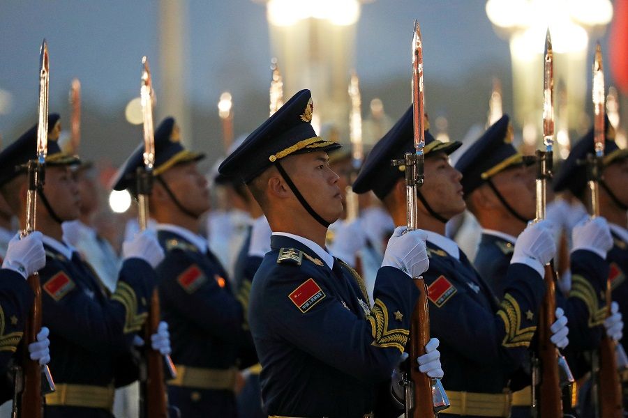 Members of the PLA Honour Guard attend a flag-raising ceremony at Tiananmen Square on National Day to mark the 71st anniversary of the founding of People's Republic of China, in Beijing, China, 1 October 2020. (Carlos Garcia Rawlins/Reuters)
